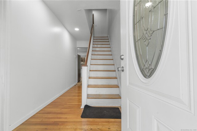 19 Plymouth Ave, Norwalk, CT 06851 - stairway featuring wood finished floors and recessed lighting