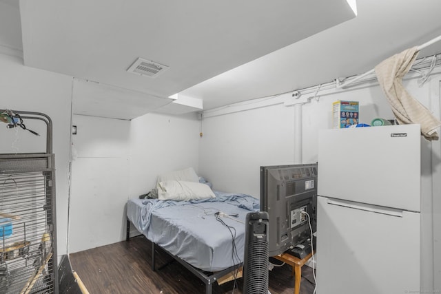 19 Plymouth Ave, Norwalk, CT 06851 - bedroom with freestanding refrigerator and wood finished floors