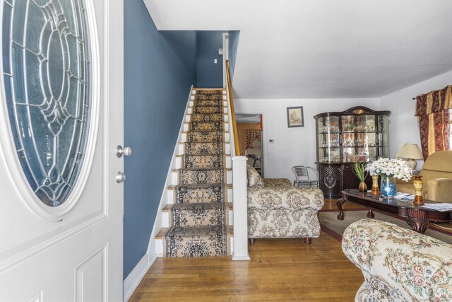 19 Plymouth Ave, Norwalk, CT 06851 - entrance foyer with stairway and wood finished floors