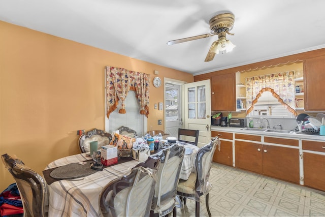 19 Plymouth Ave, Norwalk, CT 06851 - dining area with a ceiling fan and light flooring