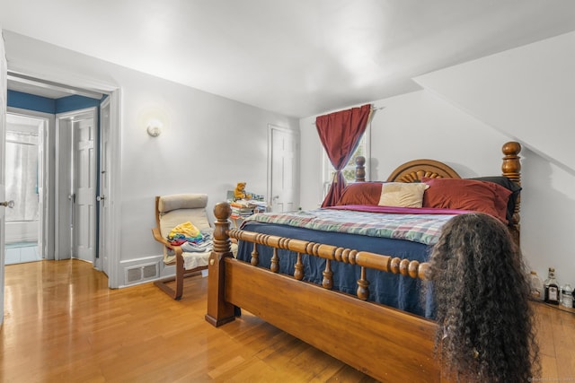 19 Plymouth Ave, Norwalk, CT 06851 - bedroom featuring wood finished floors and ensuite bathroom