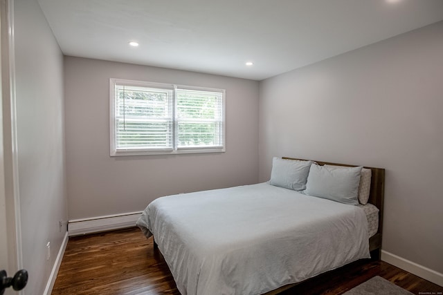 7 Derenthal Dr, Madison, CT 06443 - bedroom with a baseboard radiator, dark wood finished floors, and recessed lighting
