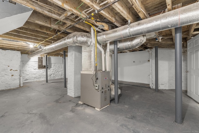 78 Pine St, Waterbury, CT 06710 - unfinished below grade area featuring heating unit and electric panel