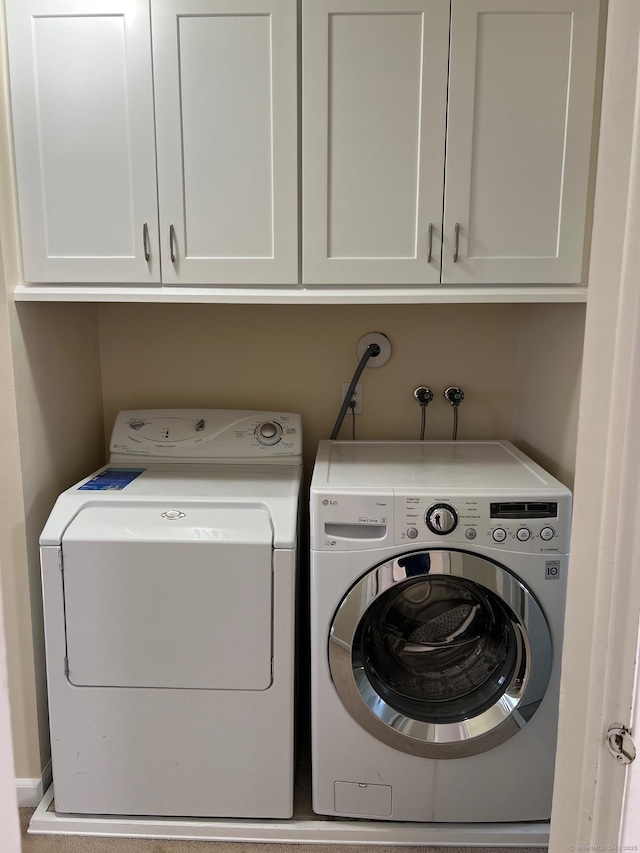 29 Van Buren Ave Unit H7, Norwalk, CT 06850 - laundry area with washing machine and dryer and cabinet space