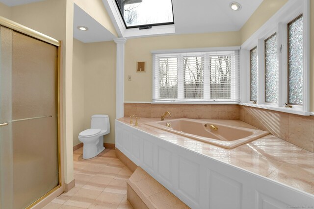67 Transylvania Rd, Roxbury, CT 06783 - full bath with a shower stall, a garden tub, a skylight, vaulted ceiling, and recessed lighting