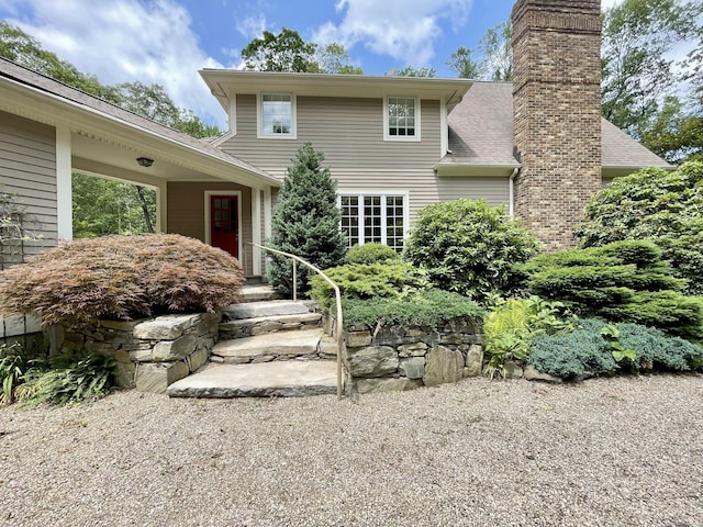 67 Transylvania Rd, Roxbury, CT 06783 - view of front facade featuring a chimney and a shingled roof