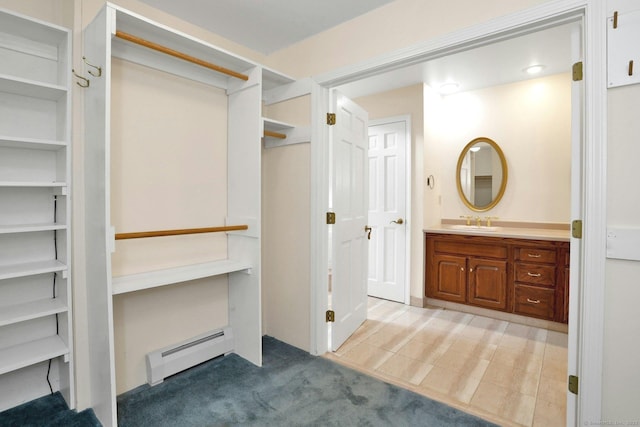 67 Transylvania Rd, Roxbury, CT 06783 - spacious closet featuring baseboard heating and light colored carpet
