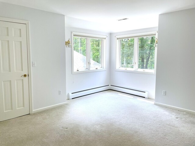 67 Transylvania Rd, Roxbury, CT 06783 - carpeted empty room featuring healthy amount of natural light and a baseboard heating unit