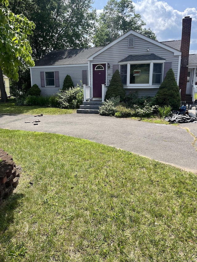 81 Cornwall Dr, Windsor Locks, CT 06096 - view of front of house with a front lawn