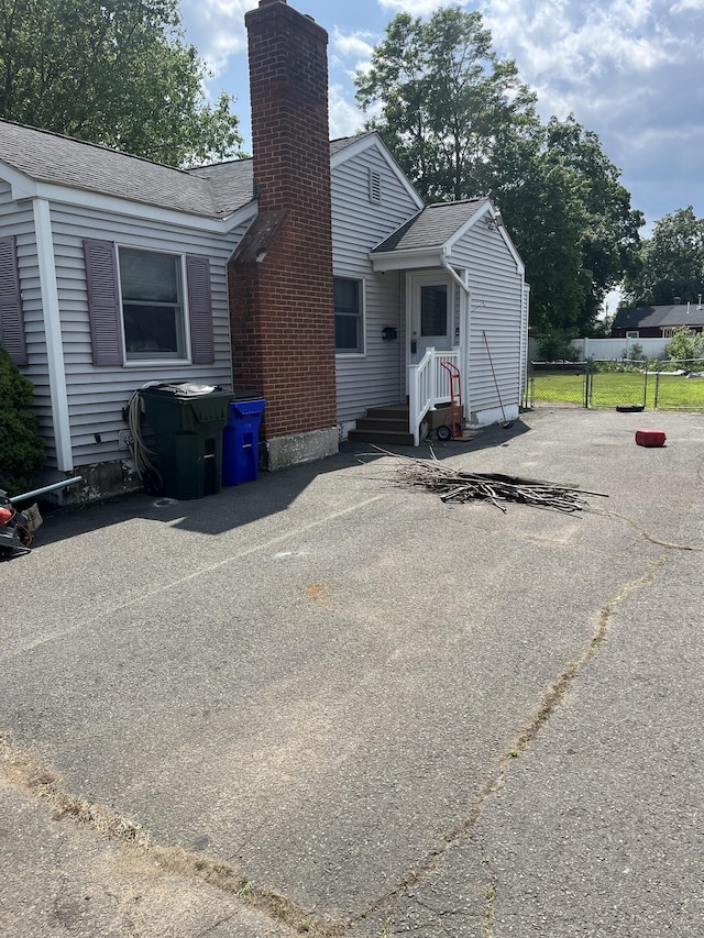 81 Cornwall Dr, Windsor Locks, CT 06096 - view of front of house with a chimney