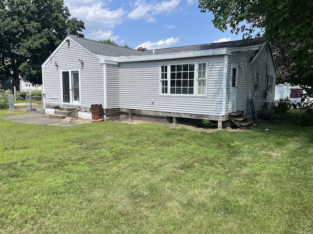 81 Cornwall Dr, Windsor Locks, CT 06096 - back of house featuring entry steps and roof with shingles