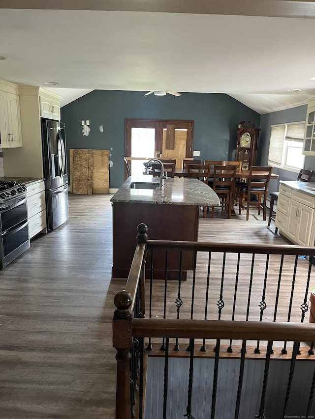 81 Cornwall Dr, Windsor Locks, CT 06096 - kitchen featuring stainless steel appliances, lofted ceiling, healthy amount of natural light, wood finished floors, and ceiling fan