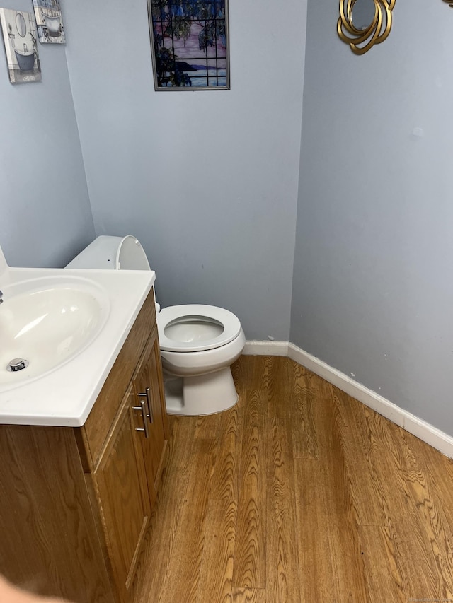 81 Cornwall Dr, Windsor Locks, CT 06096 - half bathroom featuring vanity and wood finished floors