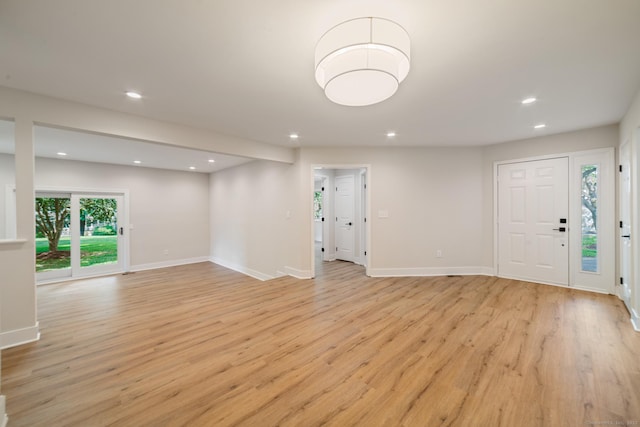 12 Boulevard Dr Unit 27-157, Danbury, CT 06810 - unfurnished living room with recessed lighting and light wood-style flooring