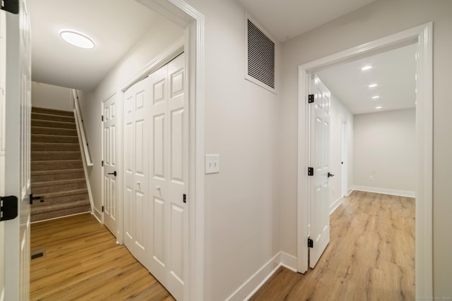 12 Boulevard Dr Unit 27-157, Danbury, CT 06810 - hallway featuring light wood-style flooring, stairs, and recessed lighting