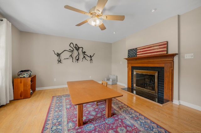 117 Woodfield Rd, Bristol, CT 06010 - living room featuring light wood-style floors, ceiling fan, and a glass covered fireplace