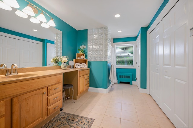 117 Woodfield Rd, Bristol, CT 06010 - bathroom featuring a closet, radiator heating unit, tile patterned flooring, vanity, and recessed lighting