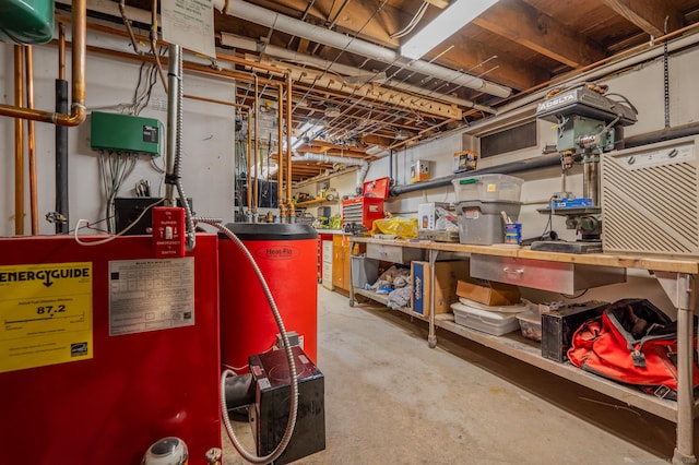 117 Woodfield Rd, Bristol, CT 06010 - unfinished below grade area featuring a workshop area and water heater