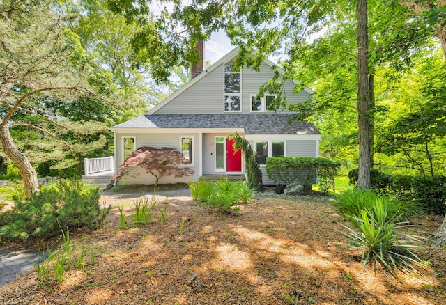 11 Island Bay Cir, Guilford, CT 06437 - view of front of home with a chimney and roof with shingles
