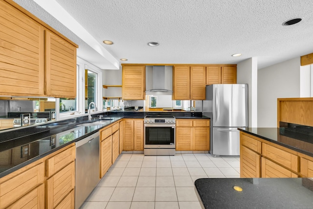 11 Island Bay Cir, Guilford, CT 06437 - kitchen featuring appliances with stainless steel finishes, wall chimney exhaust hood, recessed lighting, light tile patterned floors, and a textured ceiling