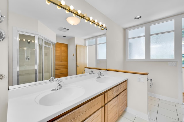 11 Island Bay Cir, Guilford, CT 06437 - bathroom featuring double vanity, a shower stall, and tile patterned flooring