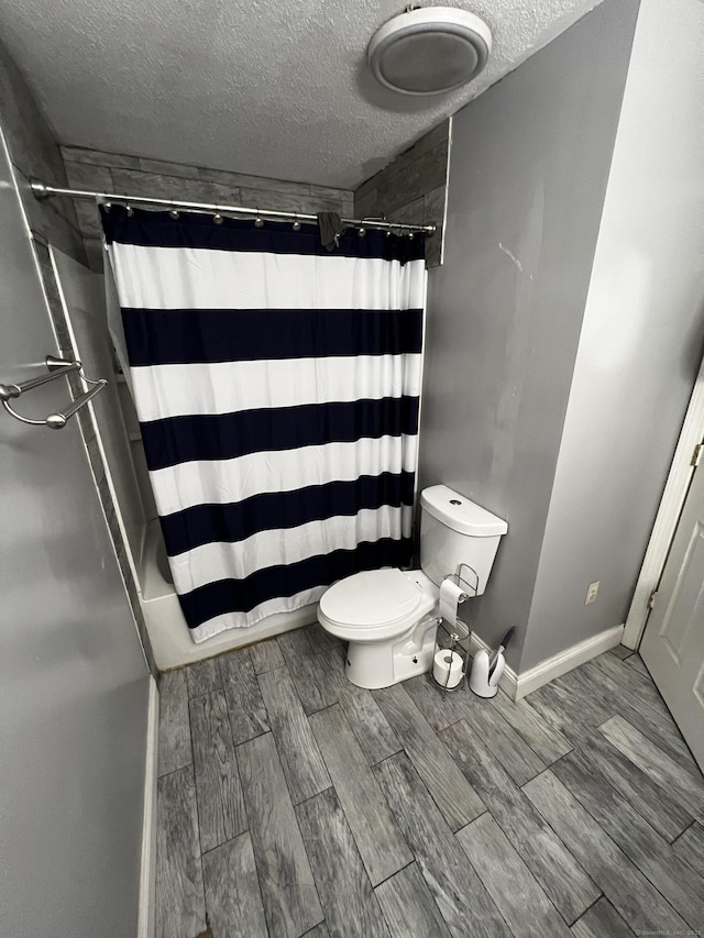 132 Maple Ave Unit B, Hartford, CT 06114 - full bathroom featuring a textured ceiling and wood finished floors