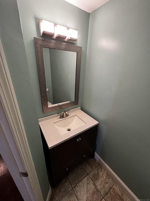 132 Maple Ave Unit B, Hartford, CT 06114 - half bathroom featuring vanity and baseboards