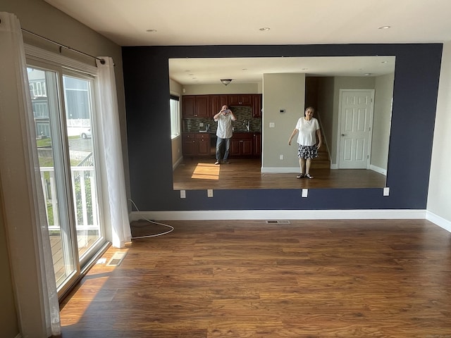 27 Bayview Pl Apt 5, West Haven, CT 06516 - unfurnished room with plenty of natural light and dark wood finished floors