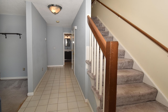 11 Thistle Way Apt D, East Windsor, CT 06016 - stairs with carpet floors and a textured ceiling