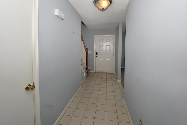 11 Thistle Way Apt D, East Windsor, CT 06016 - corridor featuring stairway and light tile patterned floors