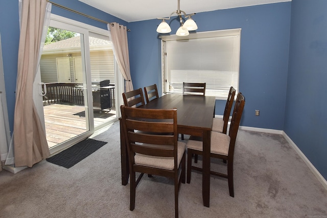 11 Thistle Way Apt D, East Windsor, CT 06016 - carpeted dining room with a chandelier and baseboards