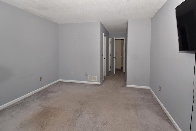 11 Thistle Way Apt D, East Windsor, CT 06016 - spare room featuring carpet flooring and a textured ceiling
