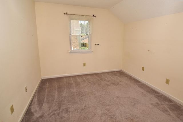 11 Thistle Way Apt D, East Windsor, CT 06016 - carpeted empty room featuring lofted ceiling and baseboards
