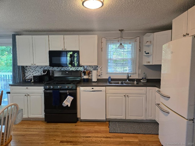 60 Spring Glen Rd, East Lyme, CT 06357 - kitchen featuring black appliances, dark countertops, white cabinetry, a textured ceiling, and open shelves