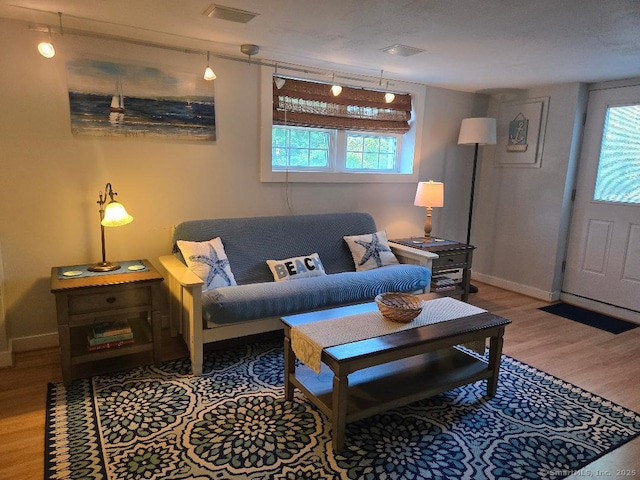 60 Spring Glen Rd, East Lyme, CT 06357 - living area featuring wood finished floors and plenty of natural light