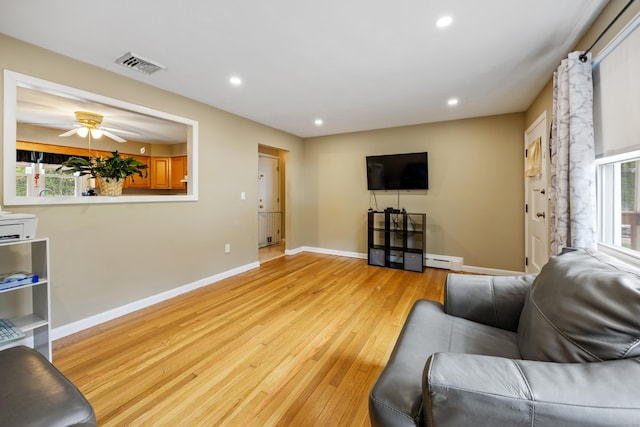 45 Summit Rd, Prospect, CT 06712 - living room with light wood-style flooring, a baseboard radiator, recessed lighting, and ceiling fan