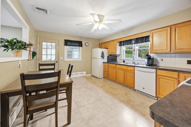 45 Summit Rd, Prospect, CT 06712 - kitchen with white appliances, dark countertops, ceiling fan, baseboard heating, and decorative backsplash