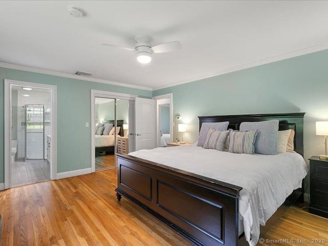 964 Red Fox Rd, Orange, CT 06477 - bedroom with ornamental molding, light wood-style flooring, a closet, connected bathroom, and ceiling fan