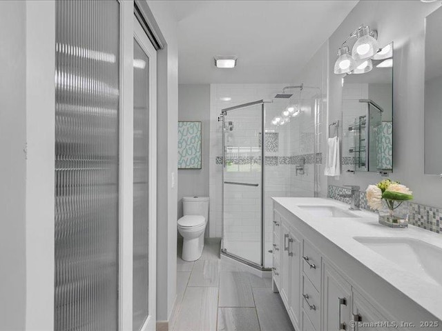 964 Red Fox Rd, Orange, CT 06477 - bathroom with double vanity, a shower stall, and tile patterned flooring