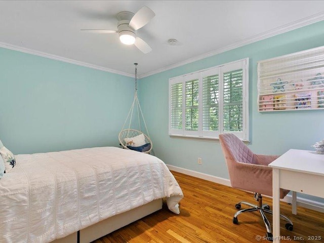 964 Red Fox Rd, Orange, CT 06477 - bedroom with wood finished floors, ornamental molding, a ceiling fan, and an office area