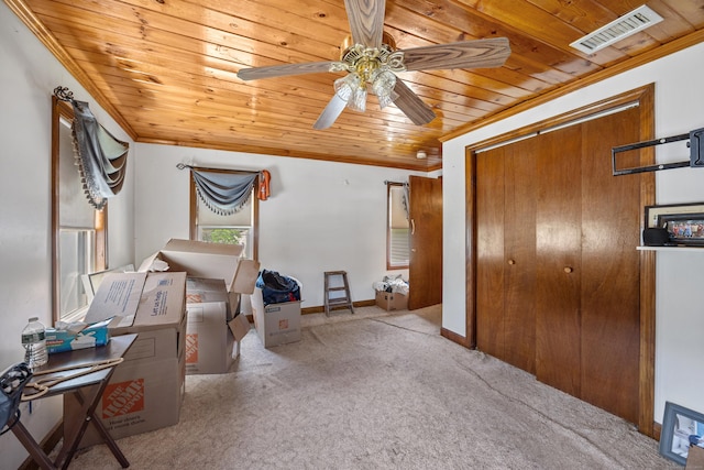 141 Peach Orchard Rd, Waterbury, CT 06706 - carpeted bedroom with wood ceiling, crown molding, a closet, and ceiling fan