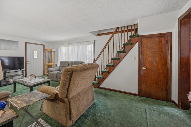 141 Peach Orchard Rd, Waterbury, CT 06706 - carpeted living room featuring a textured ceiling and stairs