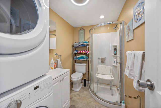 141 Peach Orchard Rd, Waterbury, CT 06706 - full bath with stacked washer and clothes dryer, a shower stall, vanity, tile patterned floors, and recessed lighting