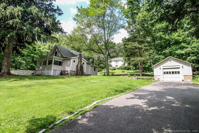 857 Marion Rd, Cheshire, CT 06410 - view of green lawn with an outbuilding, a garage, driveway, and view of scattered trees