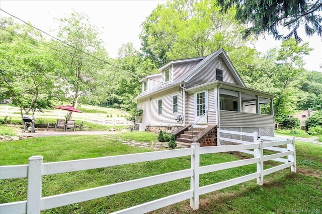 857 Marion Rd, Cheshire, CT 06410 - view of front of home featuring a fenced front yard and a sunroom