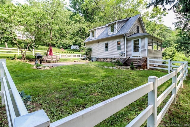 857 Marion Rd, Cheshire, CT 06410 - view of property exterior with a patio area, a shingled roof, and view of wooded area