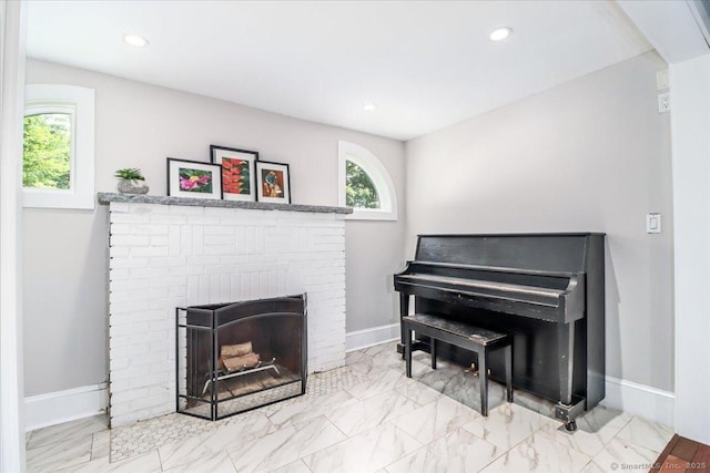 857 Marion Rd, Cheshire, CT 06410 - living area with a brick fireplace, recessed lighting, and marble finish floors