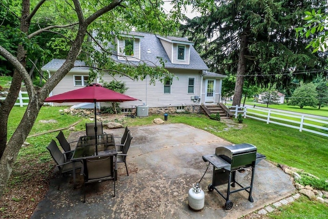 857 Marion Rd, Cheshire, CT 06410 - rear view of house with a patio area and roof with shingles