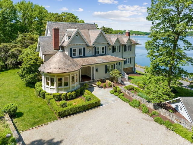 31 Contentment Island Rd, Darien, CT 06820 - victorian-style house featuring driveway, a chimney, a porch, and a water view