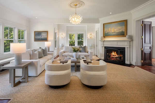 31 Contentment Island Rd, Darien, CT 06820 - living area featuring healthy amount of natural light, a fireplace with flush hearth, ornamental molding, a chandelier, and wood finished floors